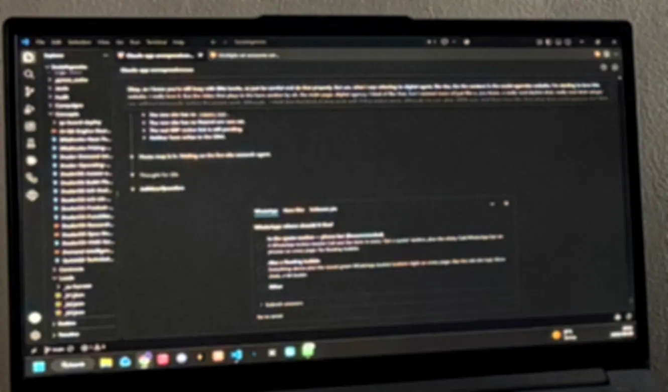 Claude Code open in a code editor on a laptop, used to build client software