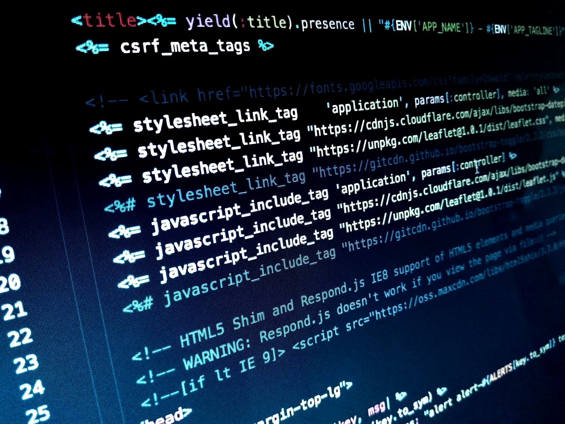 Code on a dark screen, close up