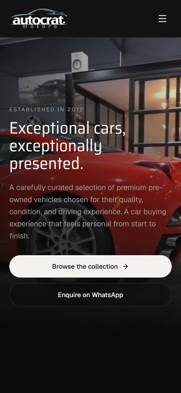 The Autocrat Motors website on a phone