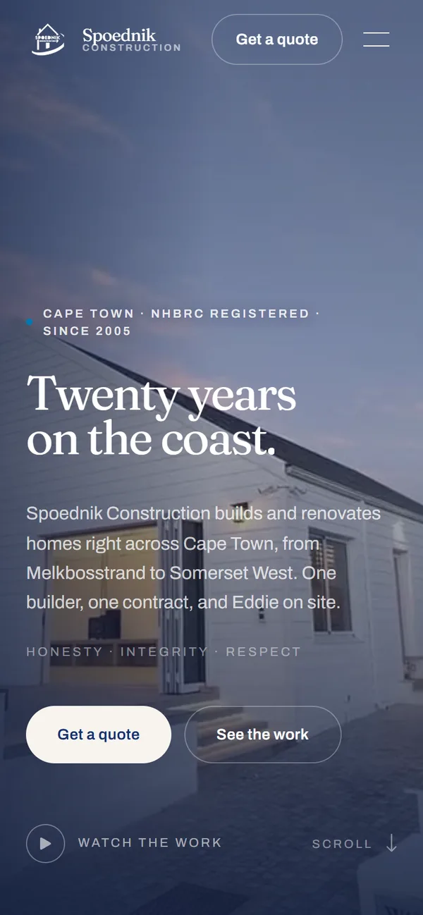 The Spoednik Construction website on a phone
